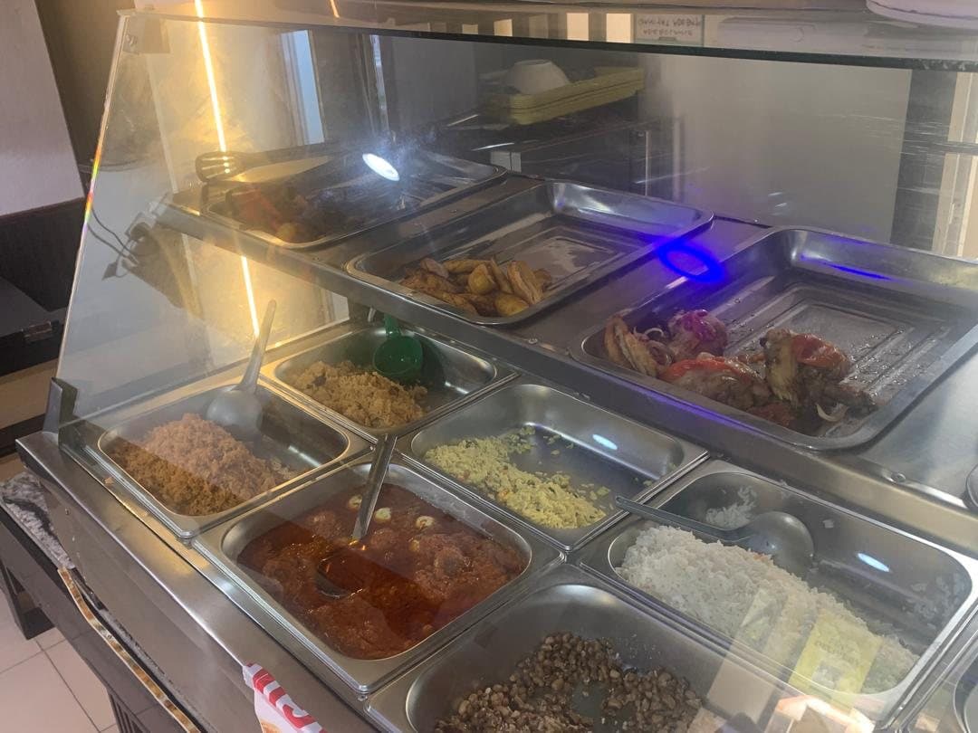 Rice, beans, stew and plantain, ready to serve